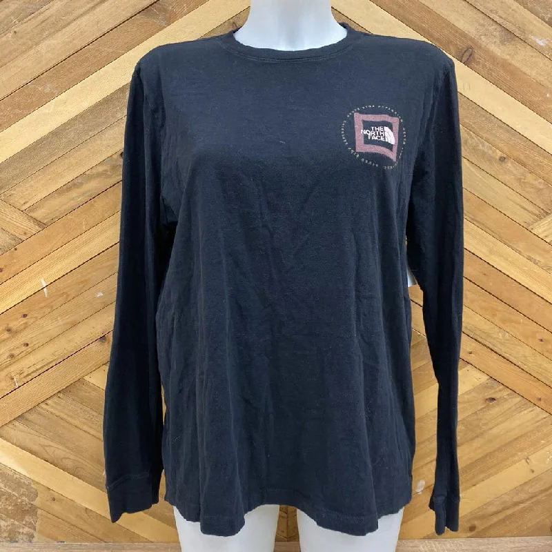 The North Face - Women's L/S Graphic T-Shirt - MSRP $60: Black/Red-women-LG-- Zippered Buttoned Snapped The North Face - Women's L/S Graphic T-Shirt - MSRP $60: Black/Red-women-LG-- Zippered Buttoned Snapped